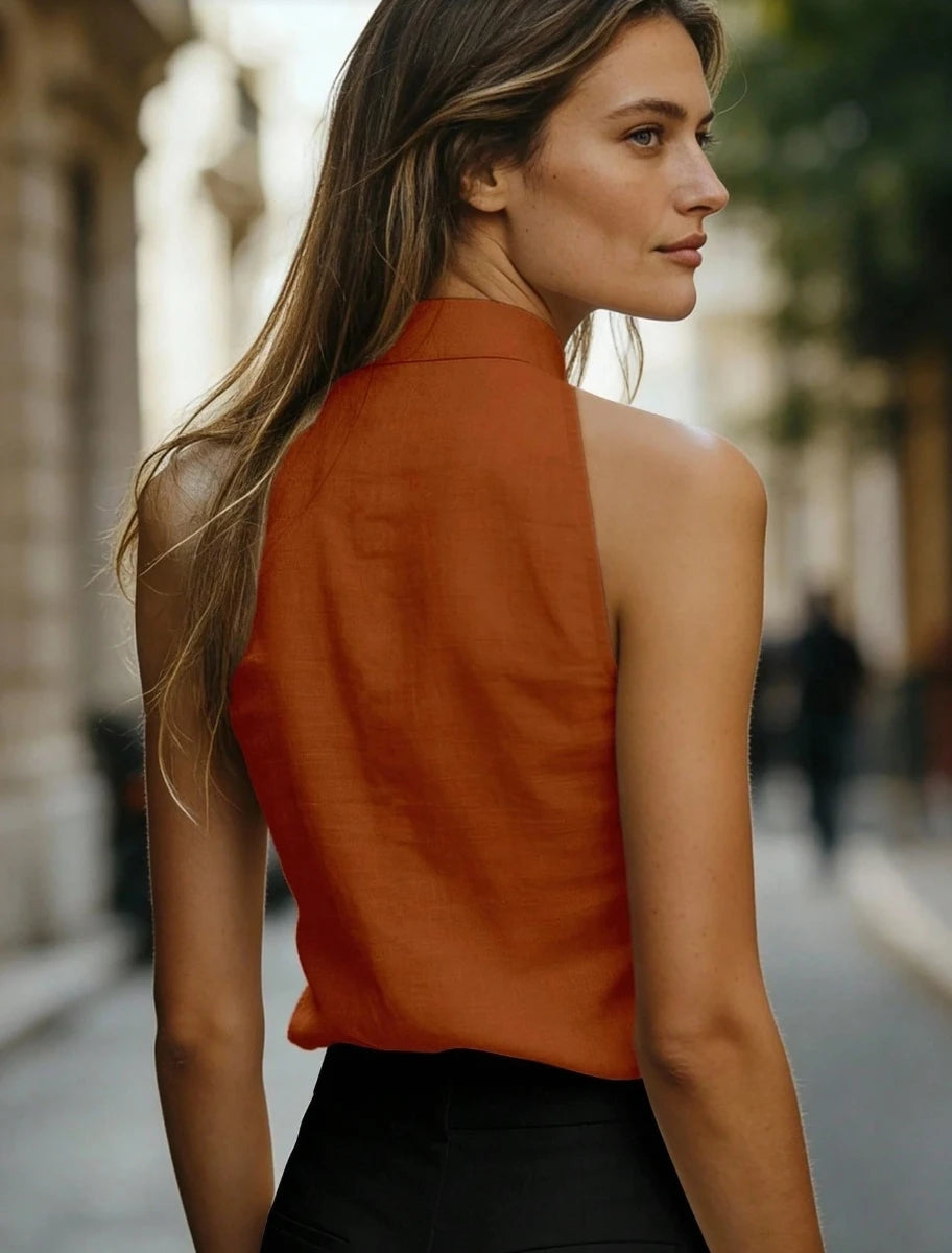 Blusa de lino premium sin mangas: elegancia atemporal y frescura.